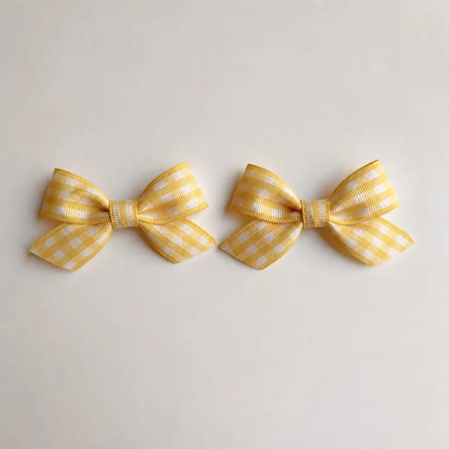 Pigtail bow pair